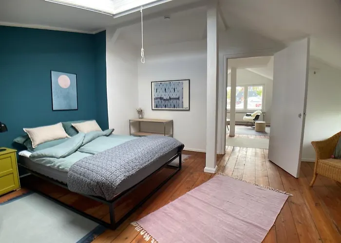 Helle Dachgeschosswohnung Mit Grosser Suedterrasse *